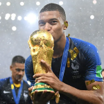 Kylian Mbappe celebrating a goal for Real Madrid at the Santiago Bernabéu