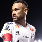 Neymar Jr celebrating a goal in his Santos FC jersey in 2026.